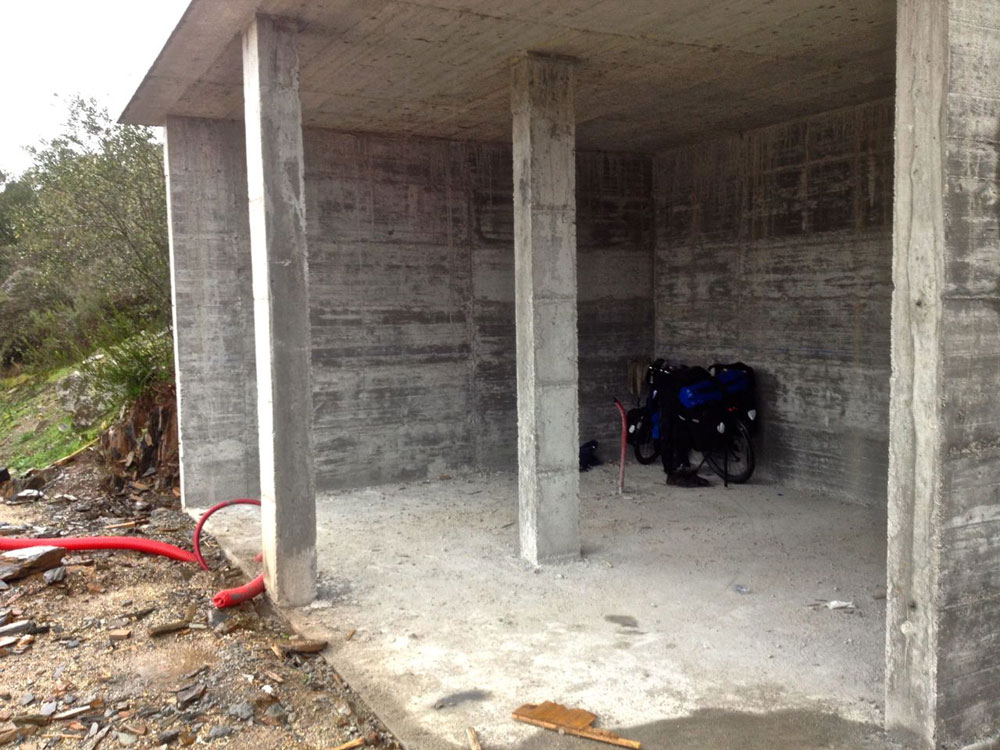 Camping in an under construction shelter in Portugal.